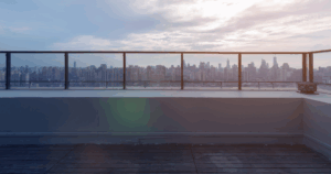 Commercial rooftop overlooking city skyline, illustrating roof color and energy impact in urban settings.