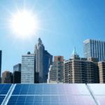 Commercial solar roofing system on a city building under bright sun, showcasing clean energy potential.