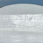 Silicone roof coating system applied to flat commercial roof in Farmington Hills Michigan