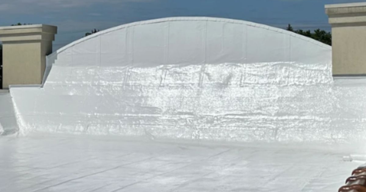 Silicone roof coating system applied to flat commercial roof in Farmington Hills Michigan